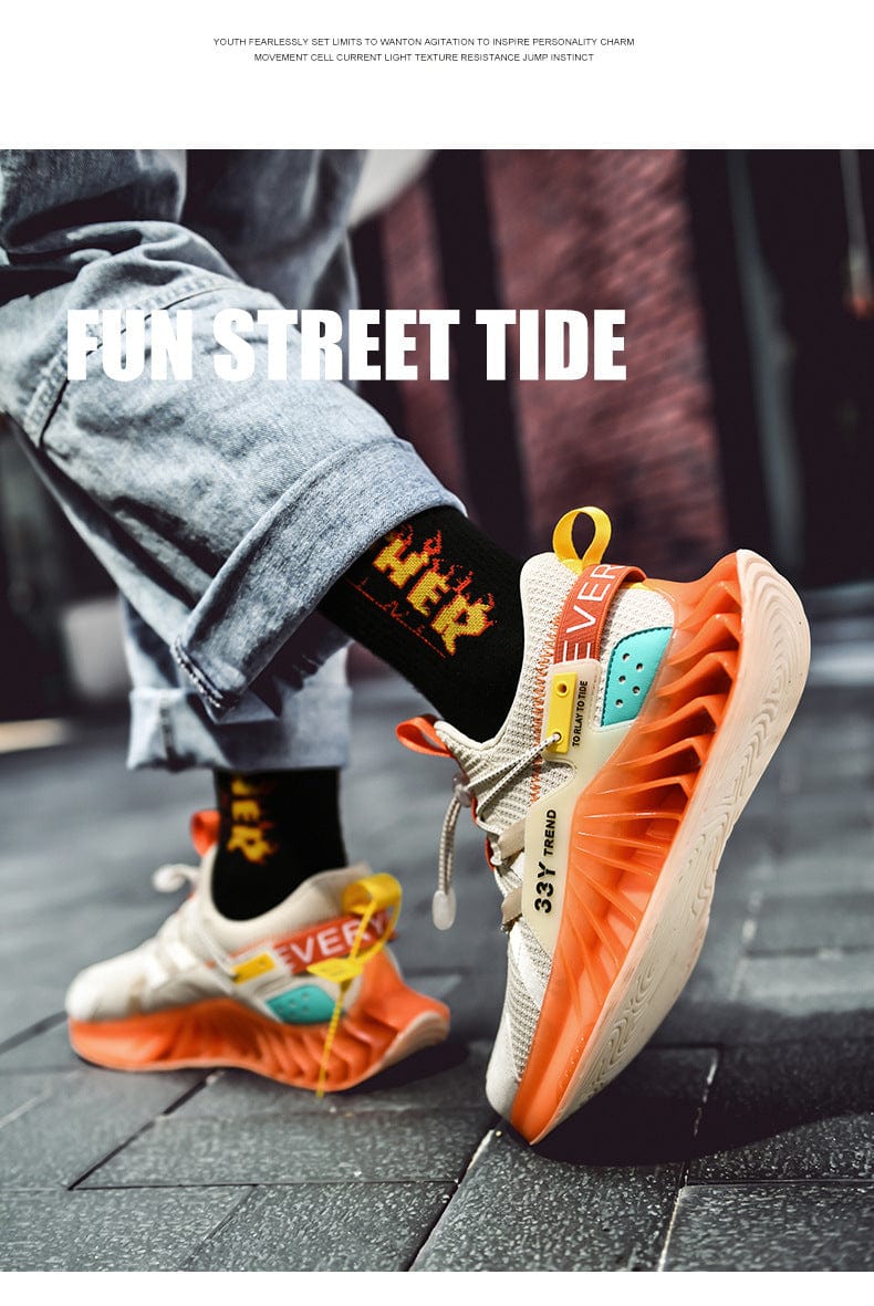 orange sneakers predatorx flashlander shoes with model walking