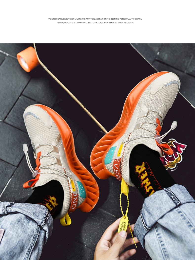 orange sneakers predatorx flashlander shoes on skateboard