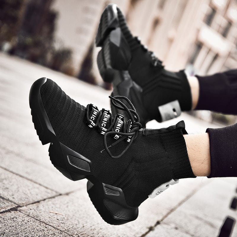 black shoes aquiles flashlander left side pair with model