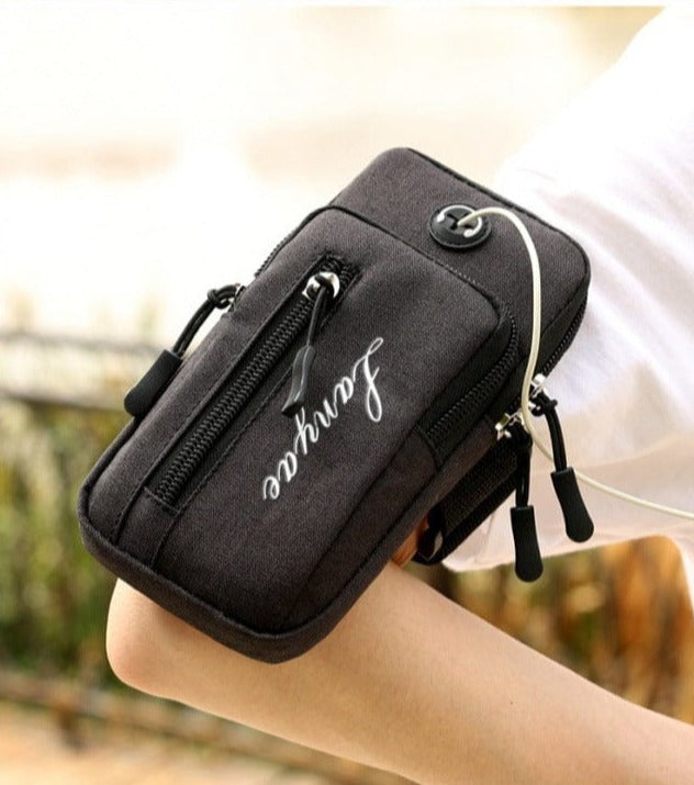 black cell phone bag and phone waist bag front side earphone pocket and hole for running and listening hands free