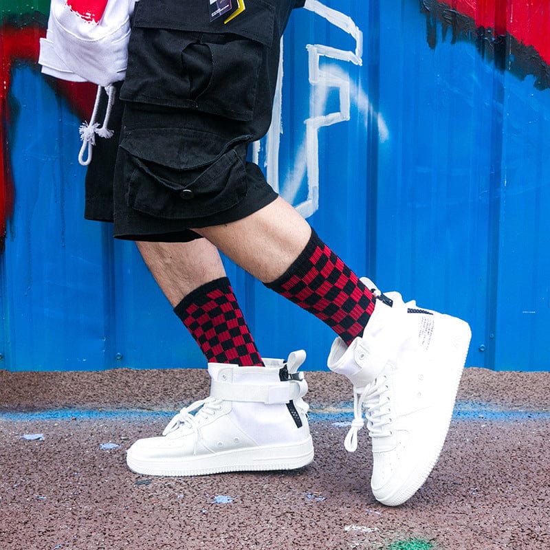 red black socks luxer flashlander man walking with socks left side