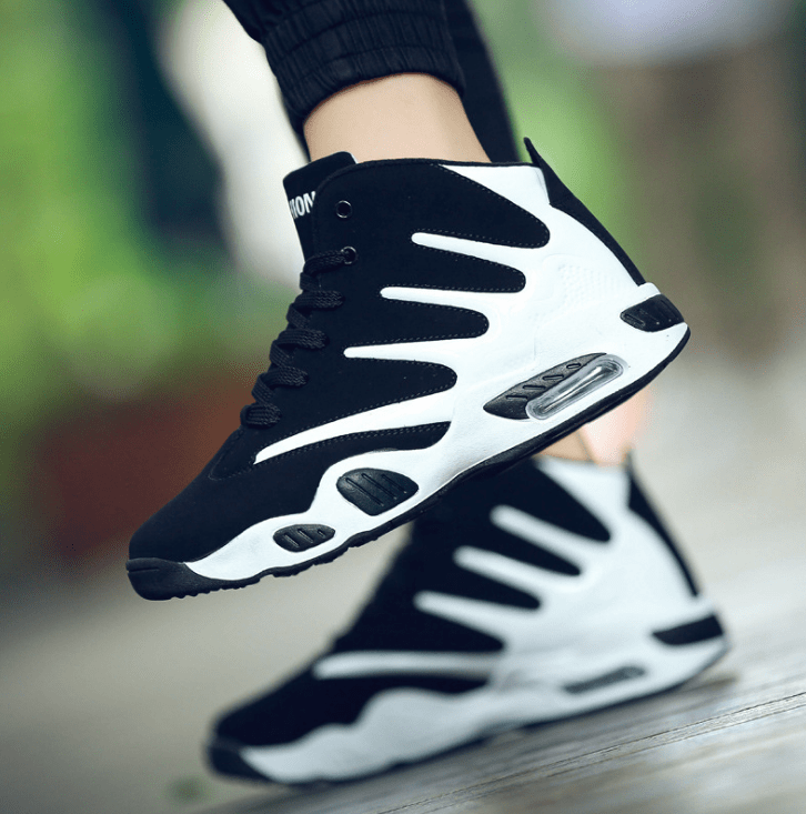 black white sneakers claw flashlander left side basketball sneakers pair man jumping with shoes
