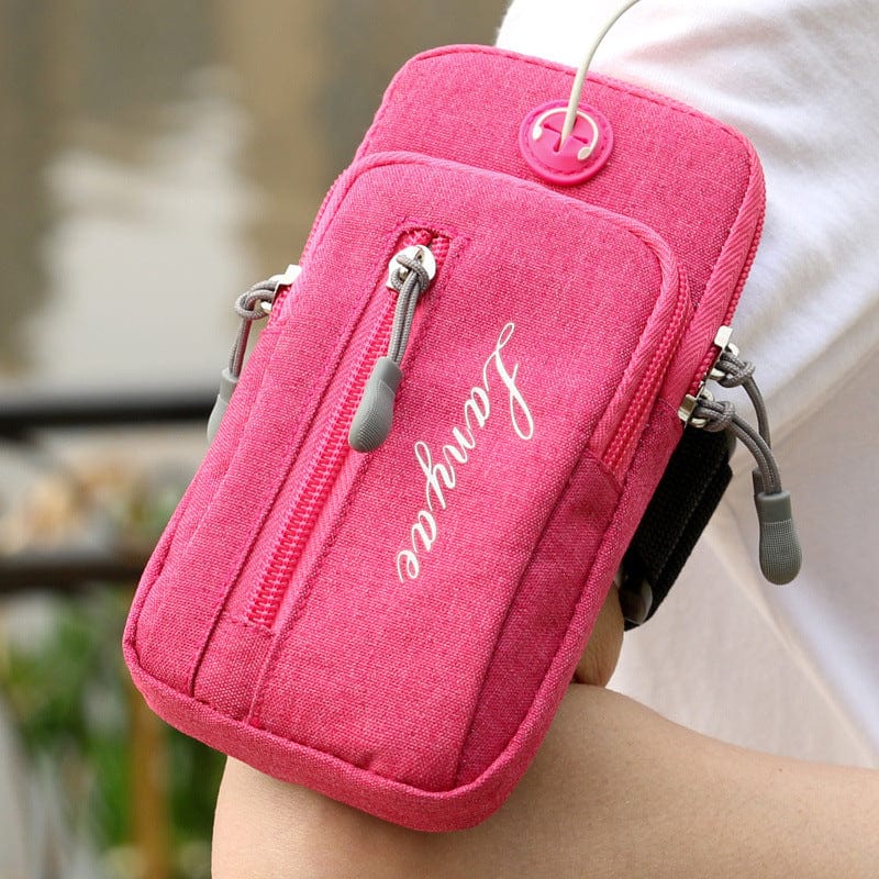 pink cell phone bag and phone waist bag front side earphone pocket and hole for running and listening hands free