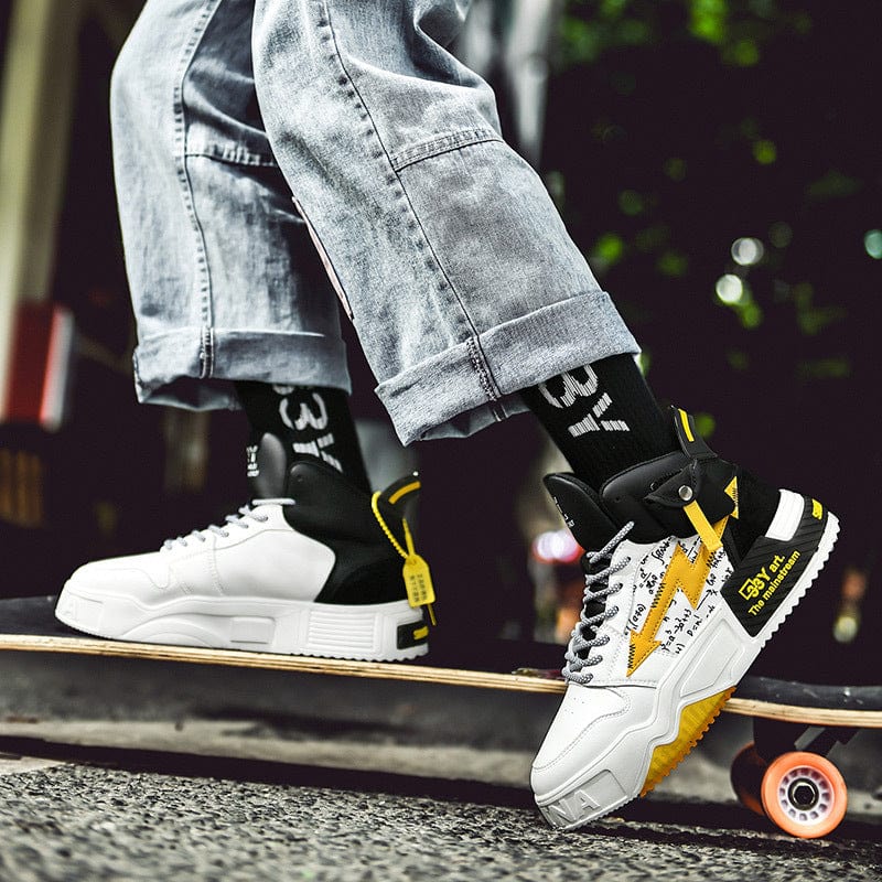white black gold sneakers exodus flashlander men model using on skateboard