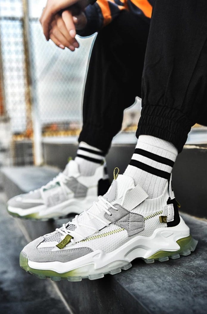 sneakers vesta flashlander green white model using shoes sit down