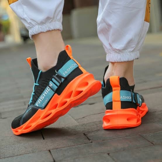 orange sneakers gladiator flashlander model walking 