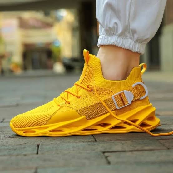 yellow sneakers gladiator flashlander left side model standing with shoes