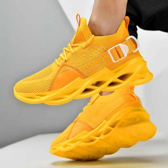 yellow sneakers gladiator flashlander model using shoes sit down